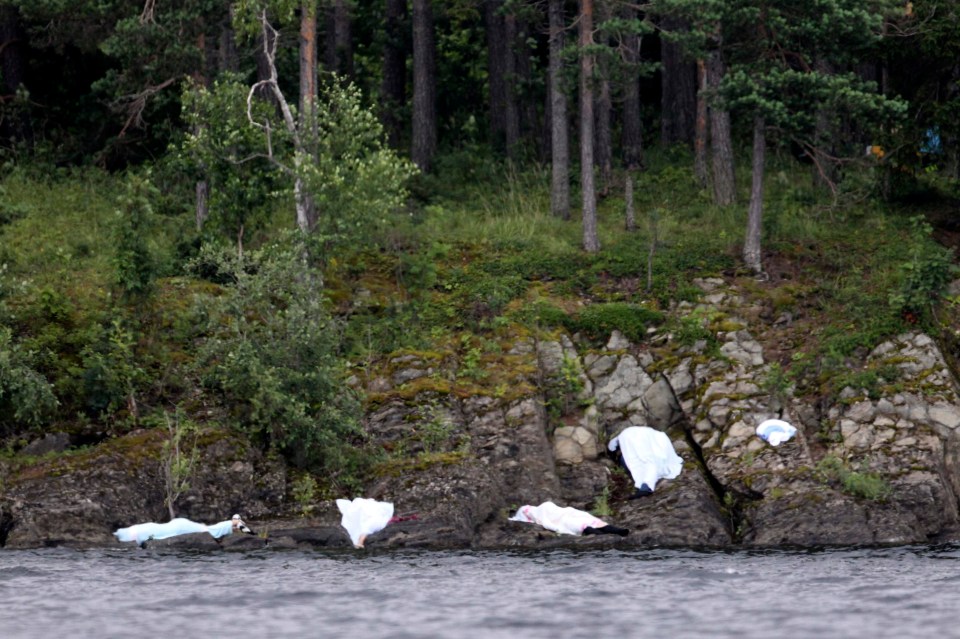 Corpses covered up after the massacre