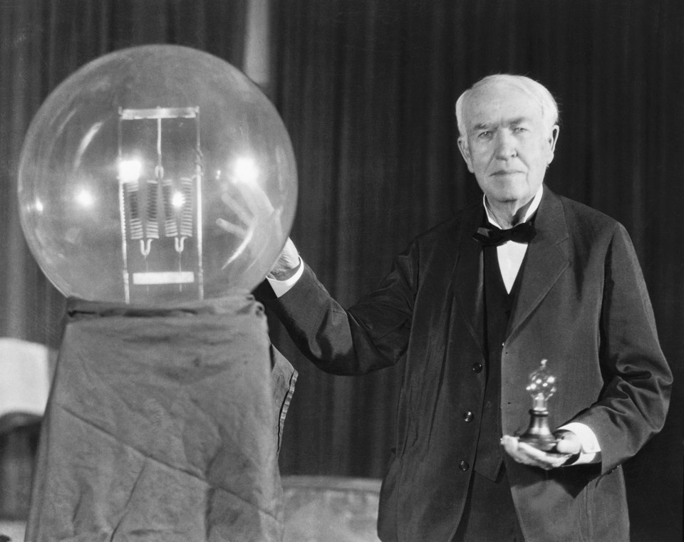 Thomas A. Edison exhibits a replica of his first successful incandescent lamp