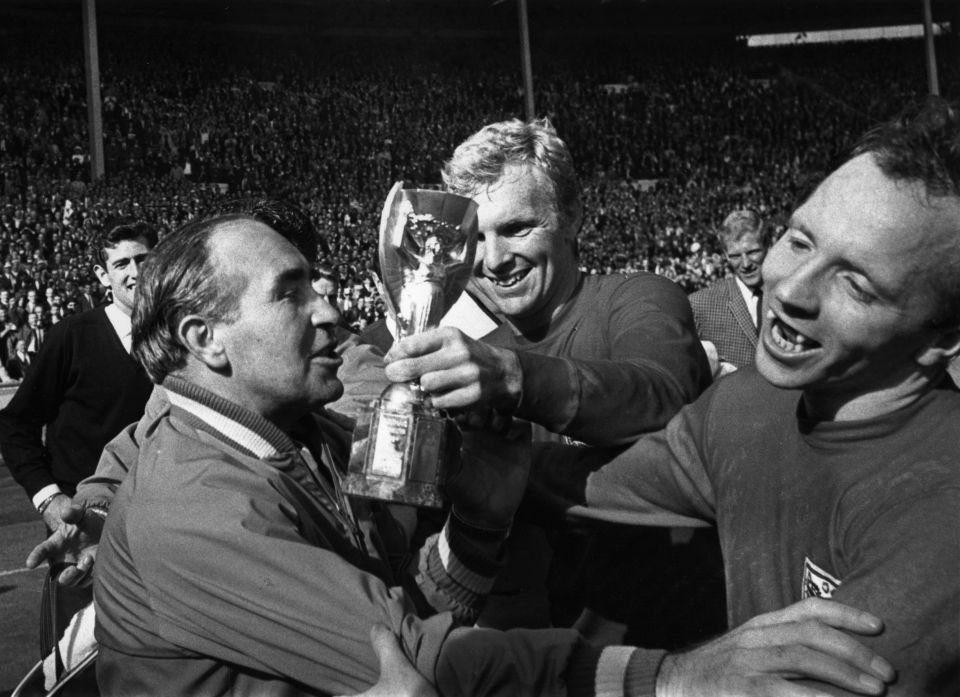 England Manager Alf Ramsey (left) celebrates his team's 1966 4-2 victory in extra time over West Germany in the World Cup Final at Wembley Stadium