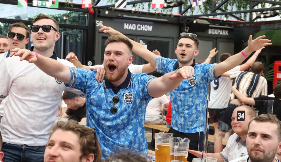 Football fans celebrate in Shoreditch, London