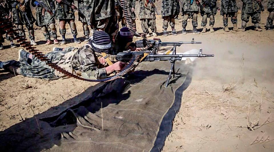 A still image taken from a propaganda video showing Taliban fighters in an Afghani training camp