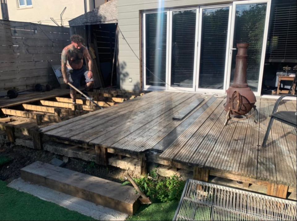 The couple  had a rotten deck and did it themselves on a budget