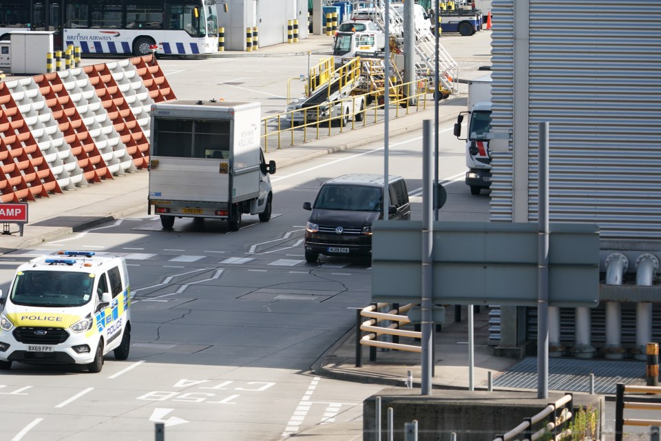 The VW MiniBus arrived at Terminal 5, with two security personnel in the front seats