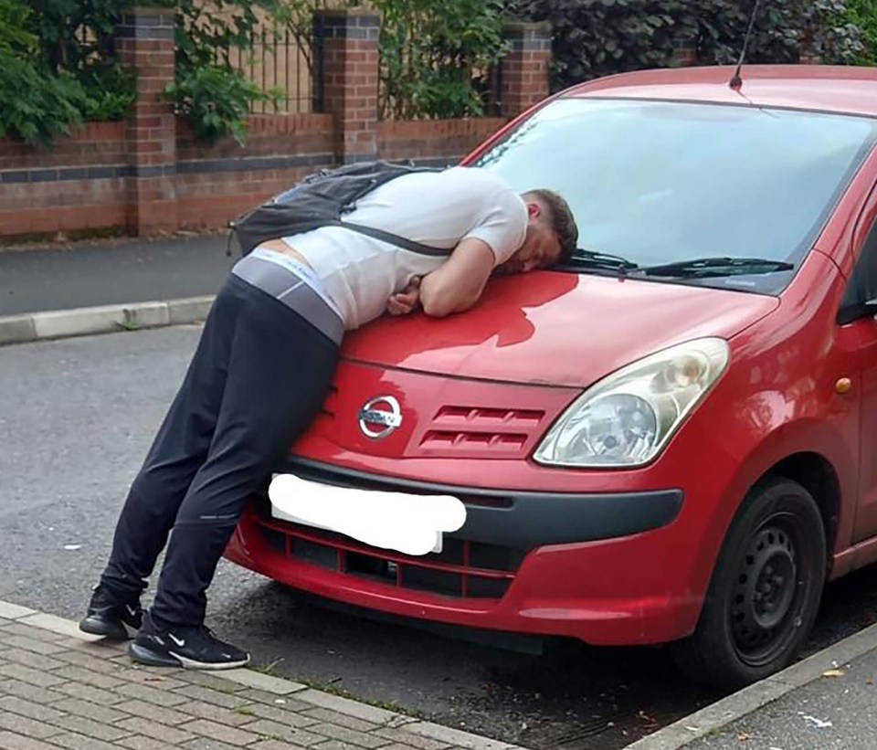 A man was discovered sleeping on a car bonnet just hours after England beat Ukraine