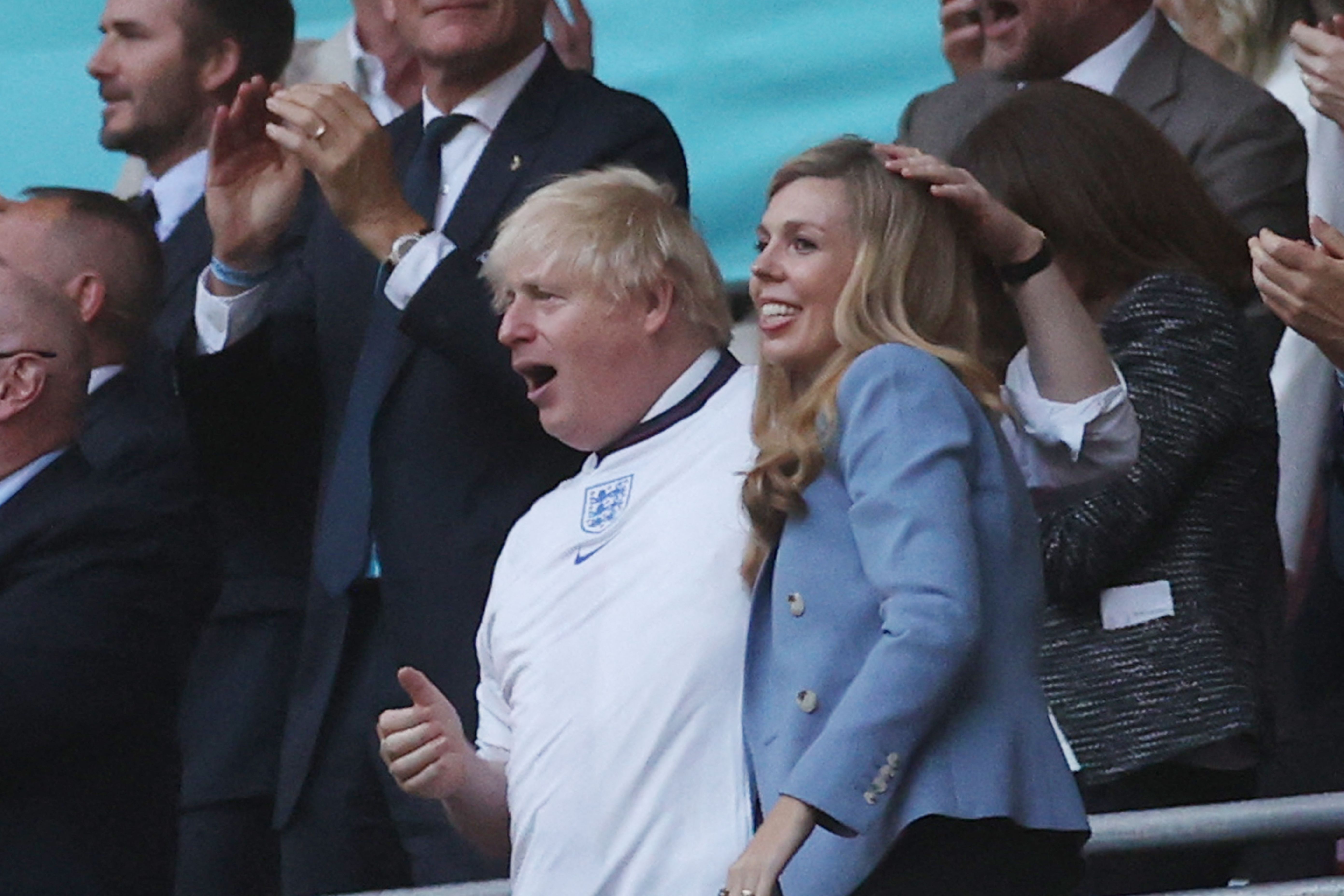 Buzzing Boris celebrates with Carrie as England score against Denmark