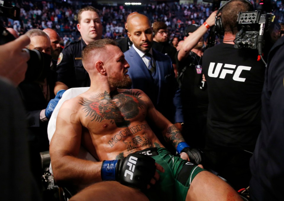 Conor McGregor left the arena on a stretcher