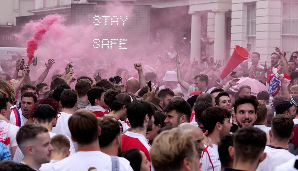 England fans cheer at St Martin-in-the-Fields near Trafalgar Square in London