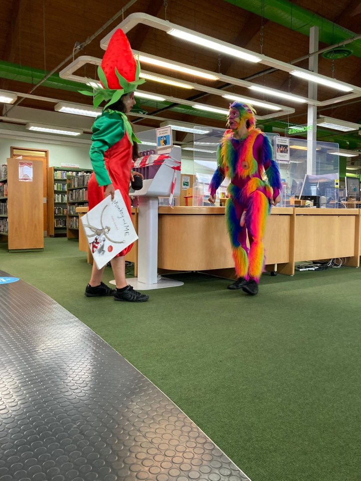 The performer wore a rainbow-coloured monkey outfit, with a bare bottom and a prosthetic penis dangling very visibly between his legs