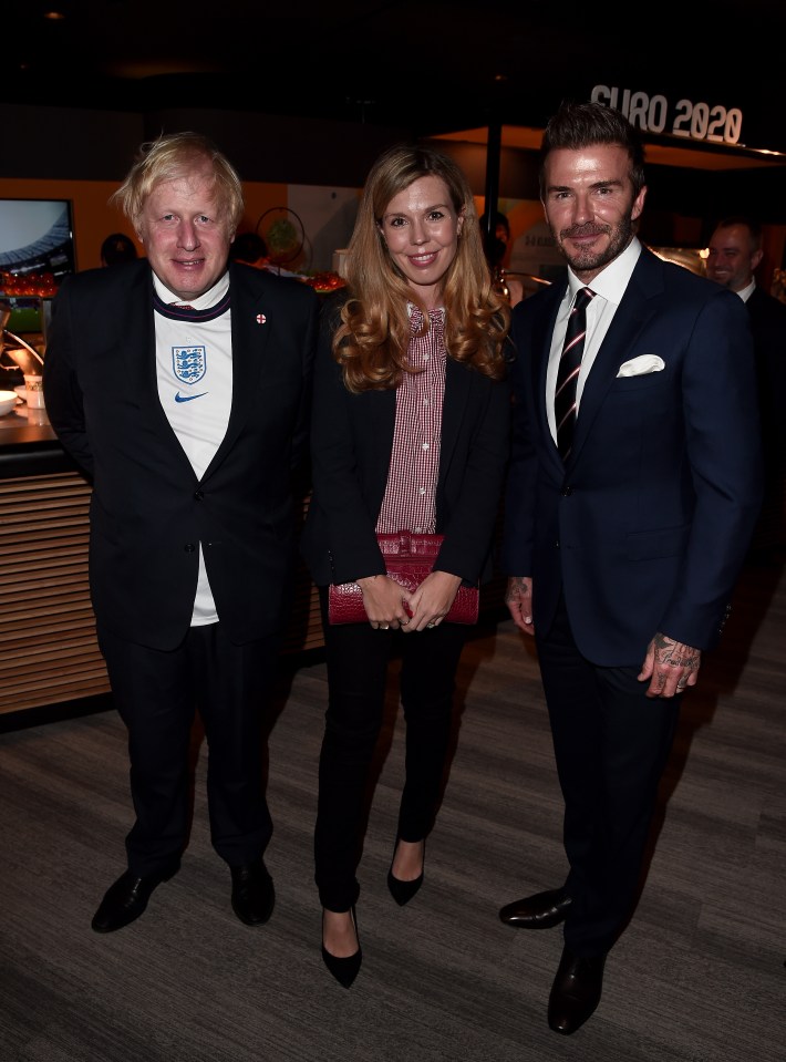 Boris Johnson, David Beckham and Carrie Symonds pose together at the Euro final