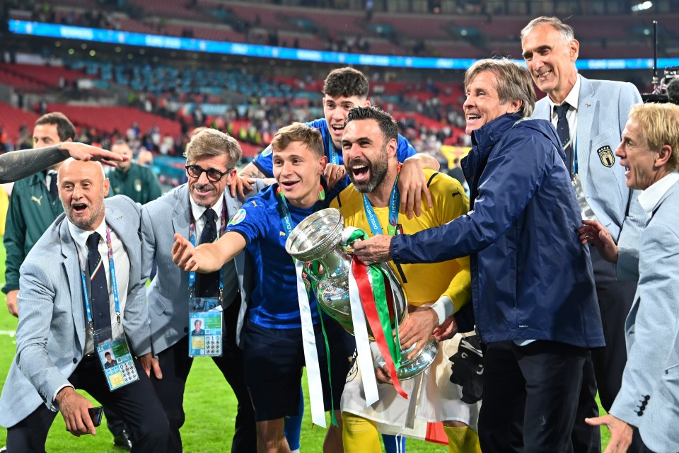 Gianluigi Donnarumma lifts the Euro trophy after his penalty heroics