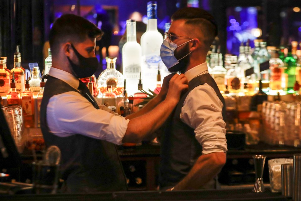 Members of staff at The Piano Works club in Farringdon, London, getting ready