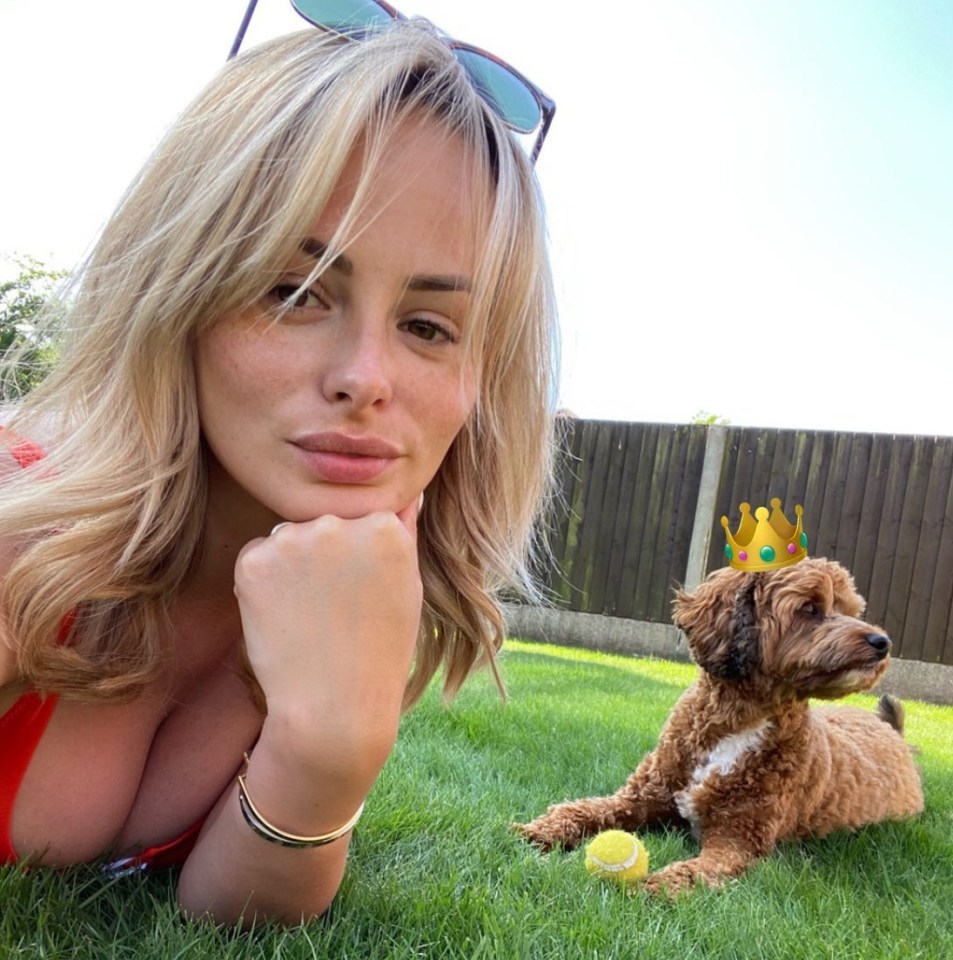 Rhian Sugden wowed in a plunging red hoop bikini top as she soaked up the sun in her garden