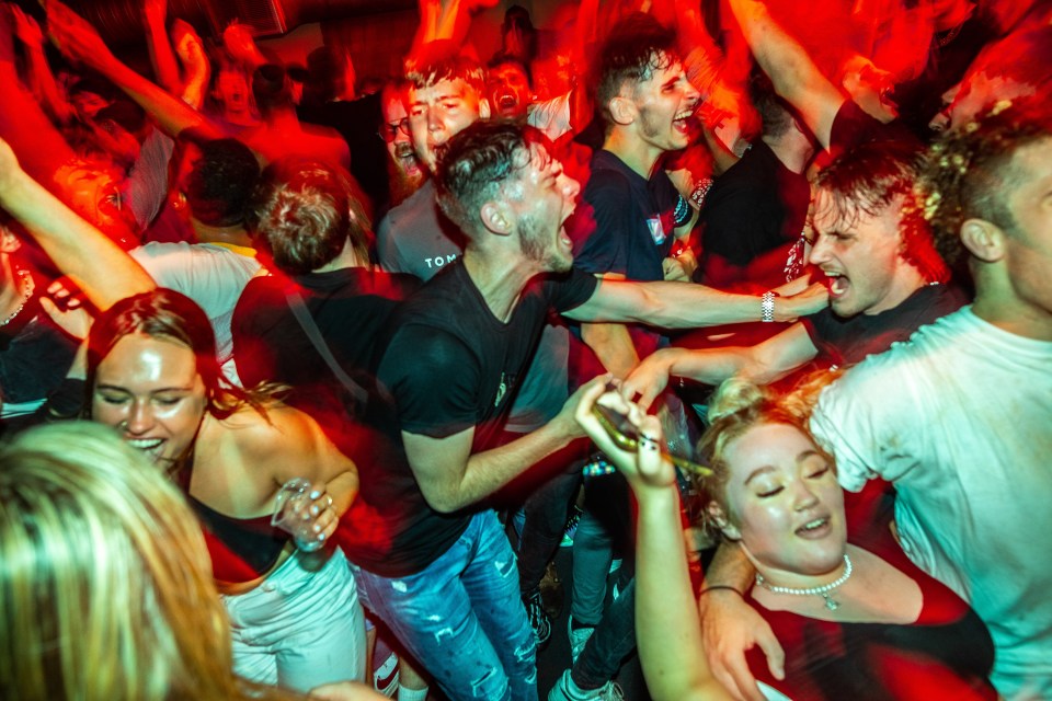 Clubbers inside FAC 51 nightclub in Manchester City Centre after midnight