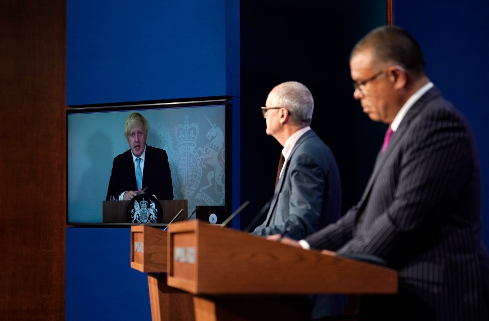 The PM speaks down the line from Chequers while top scientists Jonathan Van Tam and Patrick Vallance speak from Downing St