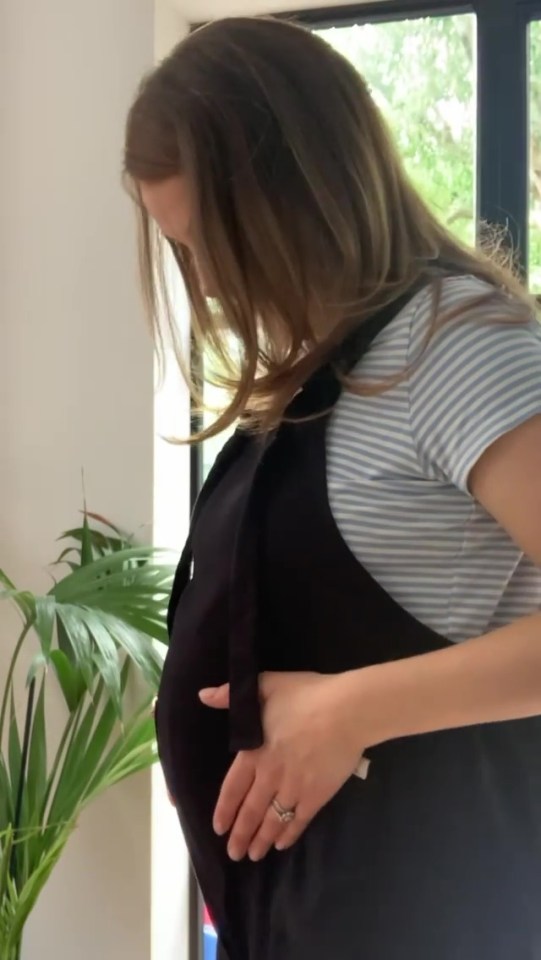 Izzy shared a look at her growing baby bump