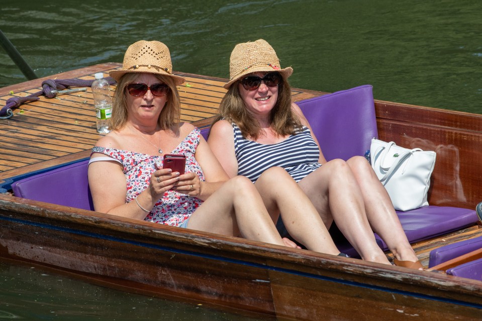 Two women trying to stay cool in Cambridge