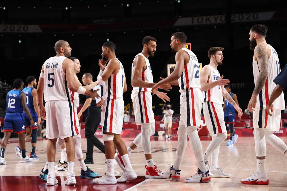 France celebrate after pulling off the upset