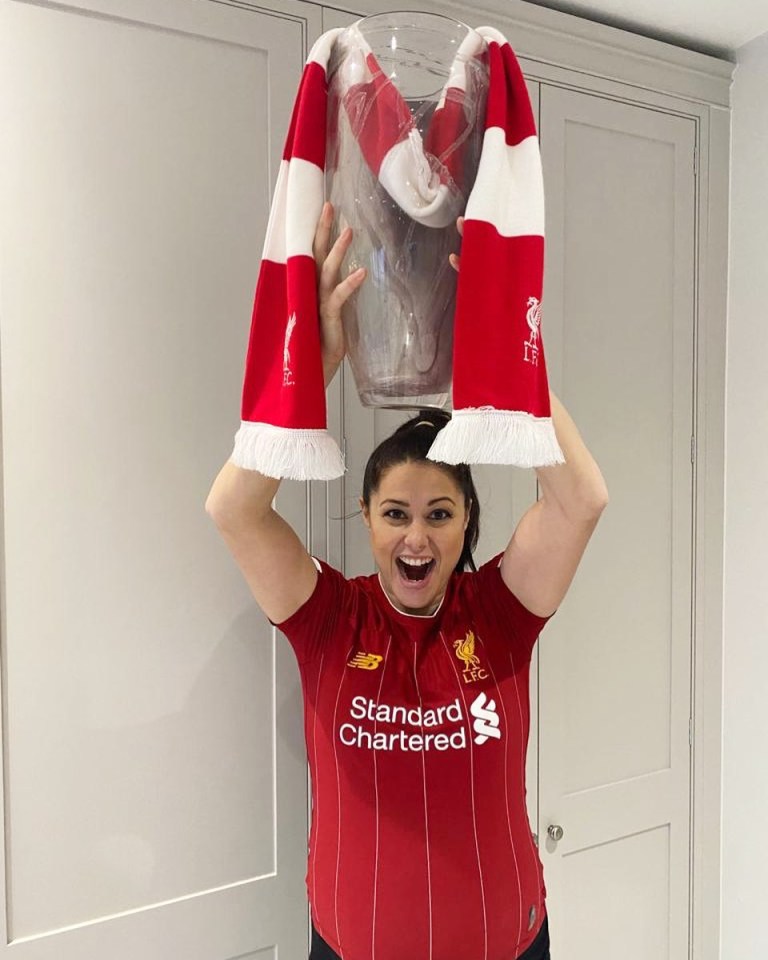 Liverpool fan Quek shows her support for the Reds