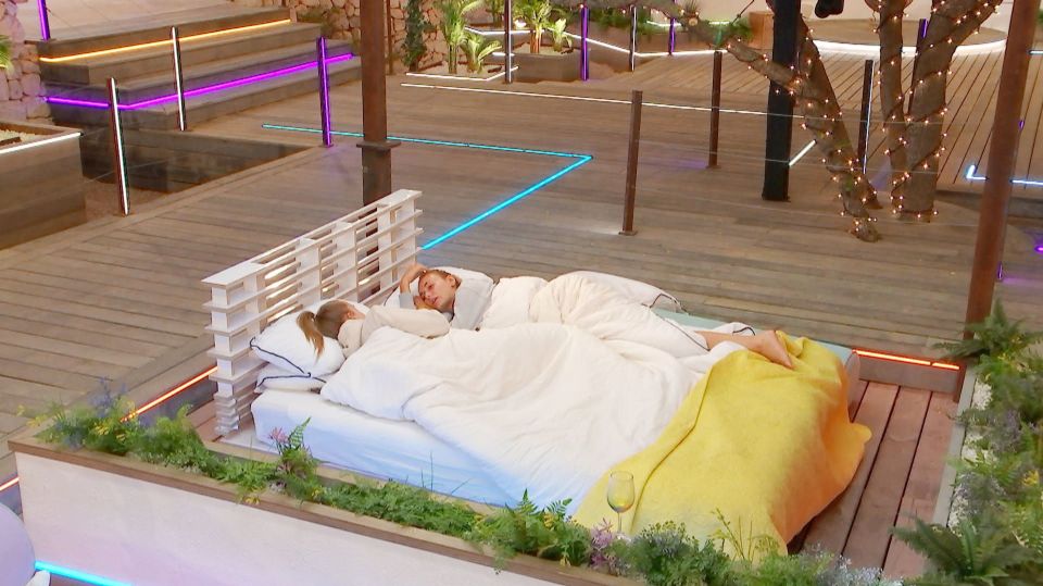 While Liam is in Casa Amor, Millie is sleeping on the day beds