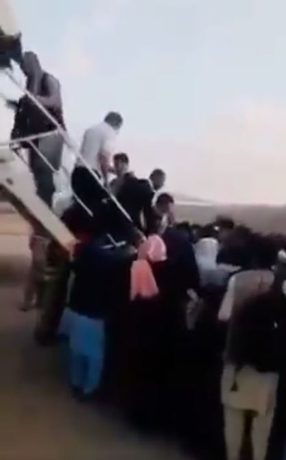 Local officials escaping on a flight to Kabul