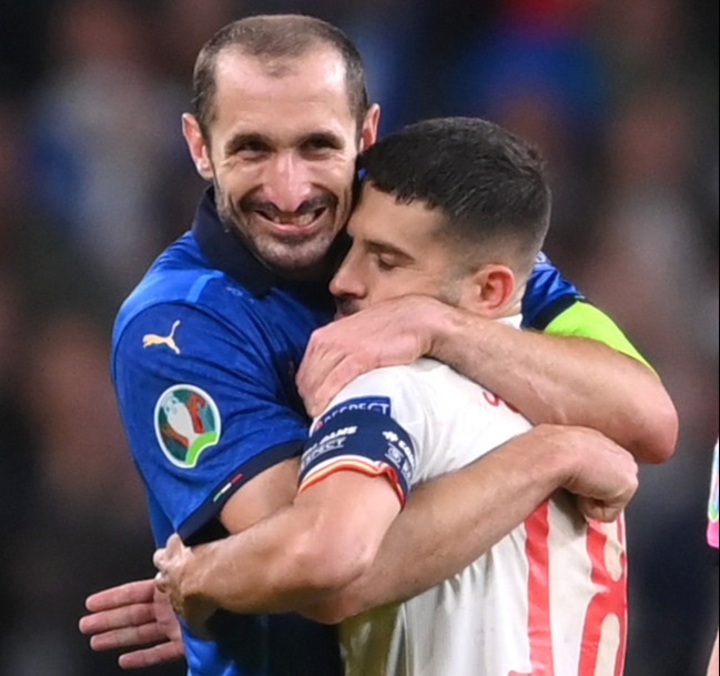 Giorgio Chiellini and Jordi Alba pictured embracing