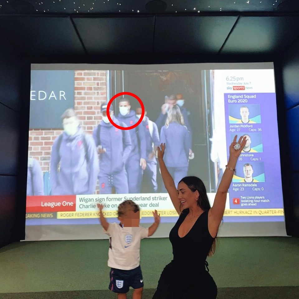 Lauryn Goodman shared a picture of her son watching the football - with Kyle Walker seen in the background