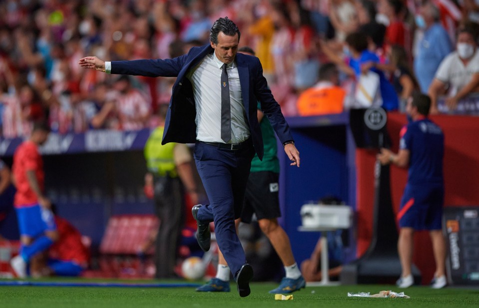 Unai Emery kicks out in frustration after Atletico's 95th minute equaliser