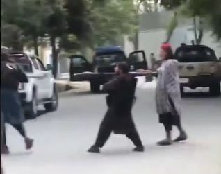 Taliban fighters were filmed pointing rocket launchers at people pulled from their homes