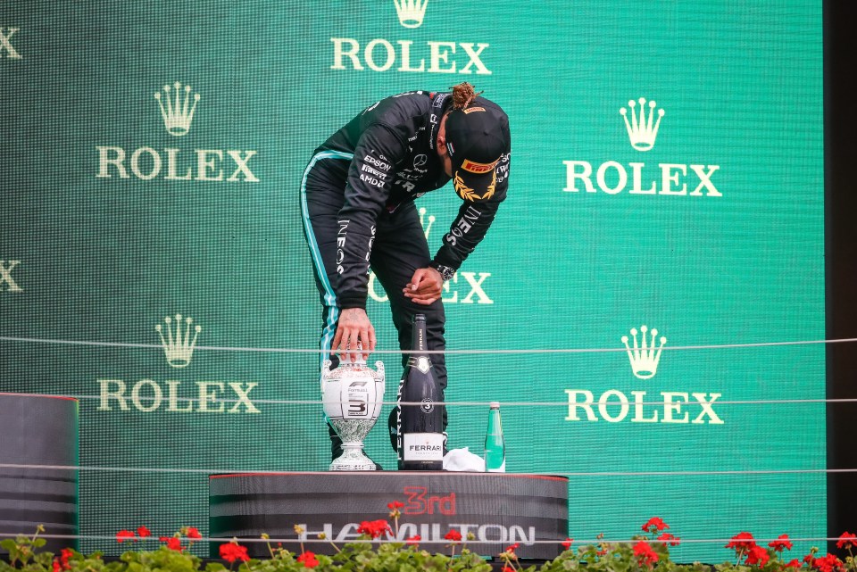 Hamilton hard a time standing up on the podium after the Hungarian GP