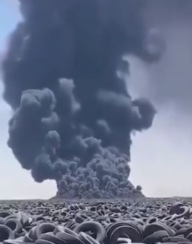 The black plume comes from some of the millions of tyres stored