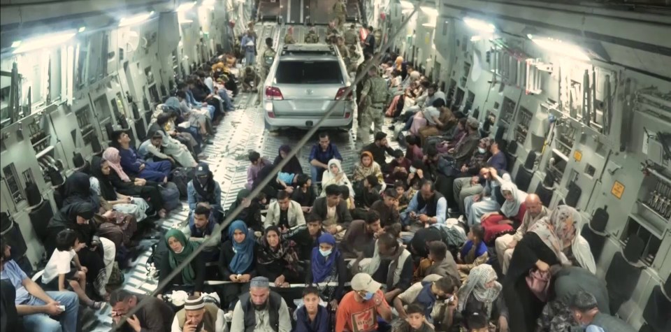 A plane packed with fleeing Afghans at Kabul airport