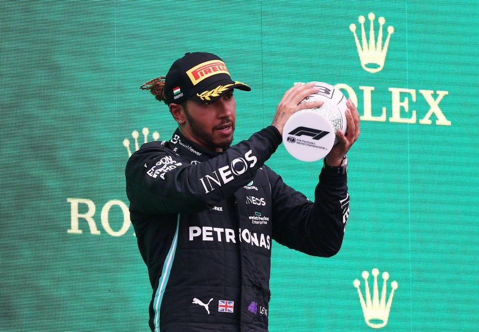 Hamilton celebrates his podium finish