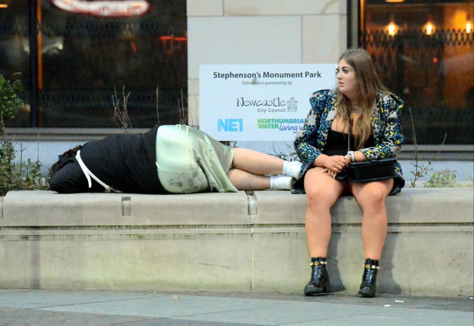 Partying got the better of one woman who took a nap on a wall