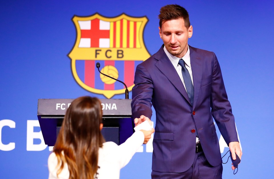 Lionel Messi's wife Antonela hands him a tissue after he breaks down in tears