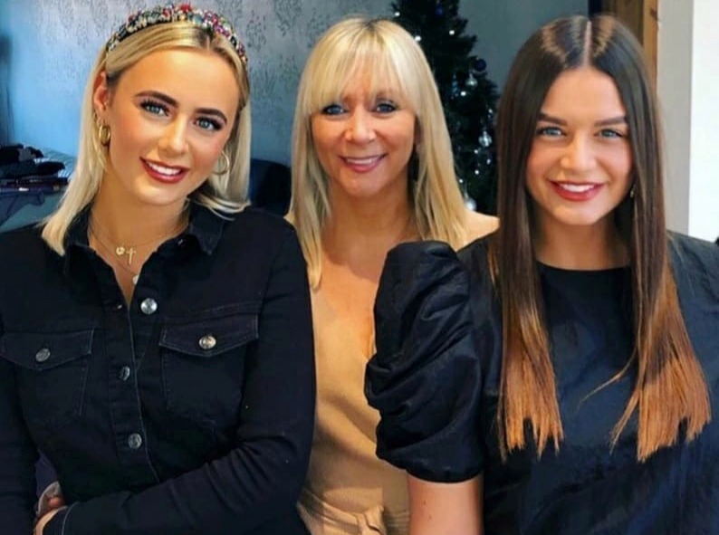 Millie with mum Esme, centre and sister Jessie, right