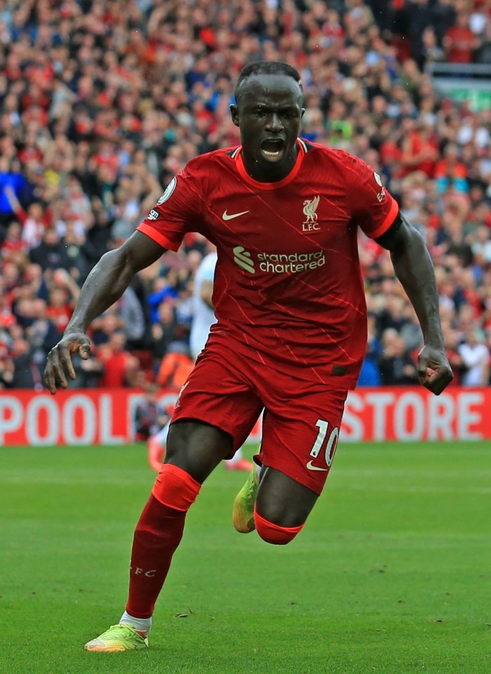 Sadio Mane wheels away in celebration after netting against Burnley