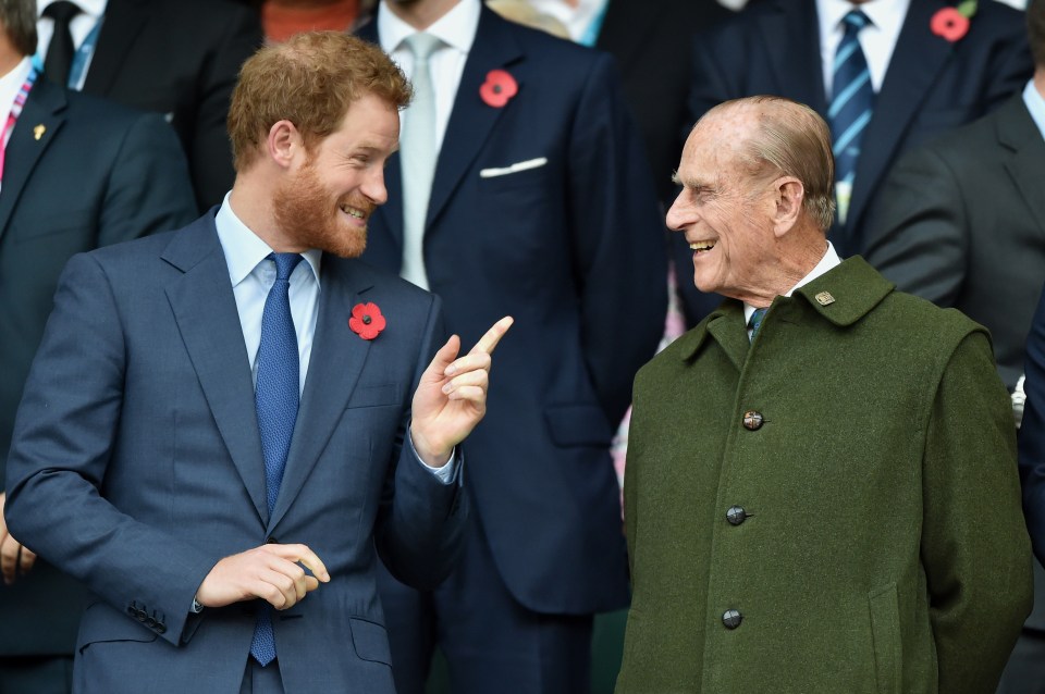 Prince Harry and Prince Philip attend the 2015 Rugby World Cup Final