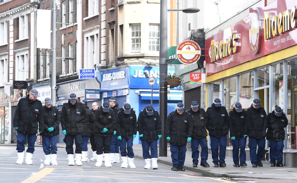 Cops search the scene in Streatham, London after the terrorist incident