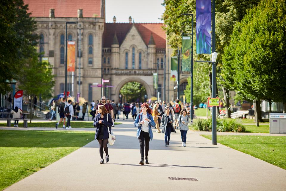 Entry to universities will be 'more competitive' than ever thanks to inflated grades, pictured students at Manchester University's Oxford Road campus