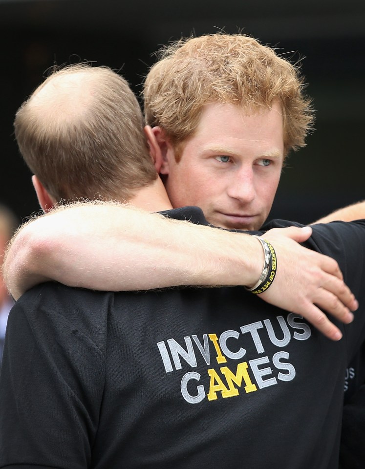 Prince William hugs brother Harry during the Invictus Games in London, 2014