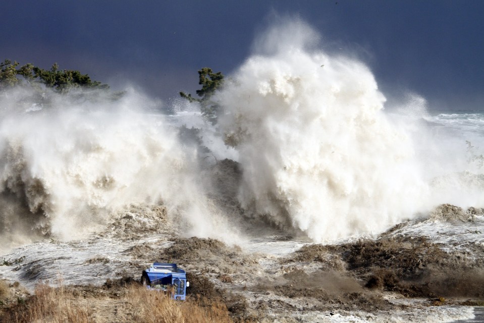 Tsunami waves hitting the coast of Minamisoma in Fukushima prefecture