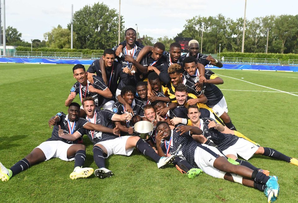 Bordeaux's U19 team celebrate winning a youth title with Kounde (yellow armband) as captain