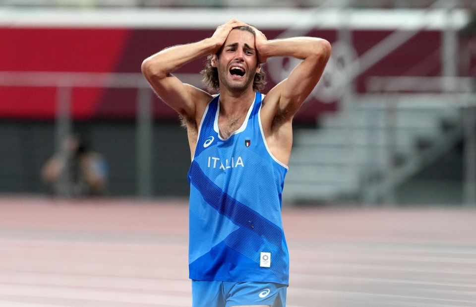 Gianmarco Tamberi celebrates winning gold in the high jump