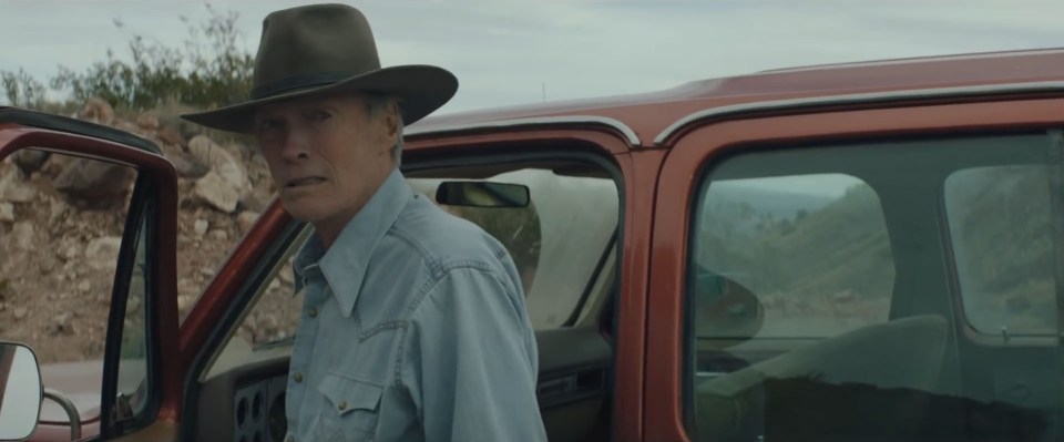 Clint Eastwood wears his trademark grimace and a Stetson as rodeo ace Mike Milo in new film Cry Macho