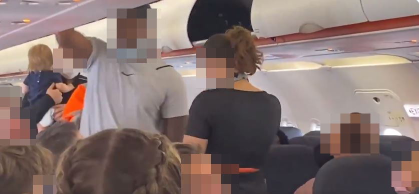 Passengers believed the crew reacted the way they did because of the men's race