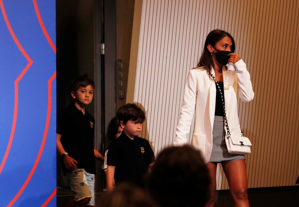 Lionel Messi's wife Antonela arrives at his press conference with their children