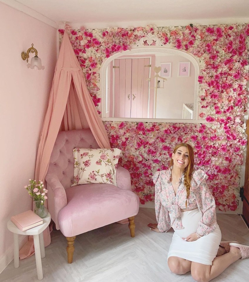 Stacey Solomon poses in her pink nursery in time for the arrival of her daughter with fiancé Joe Swash