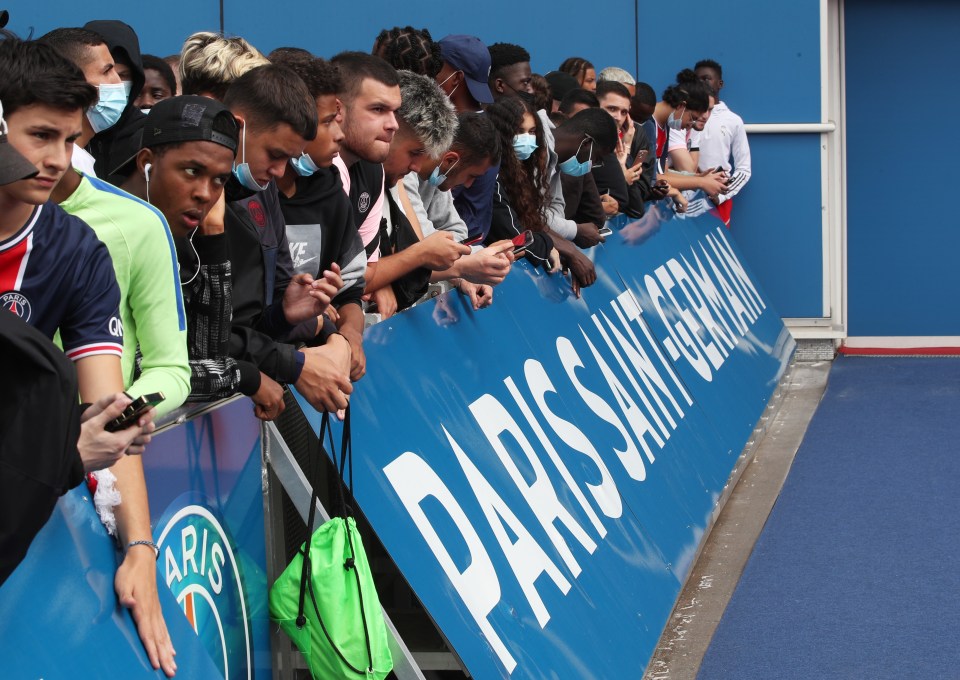 Fans gathered outside Parc des Princes on Monday to await Lionel Messi