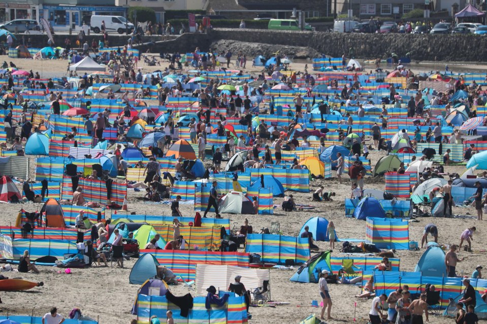 A packed beach in Cornwall last week as holidaymakers flock to the coast