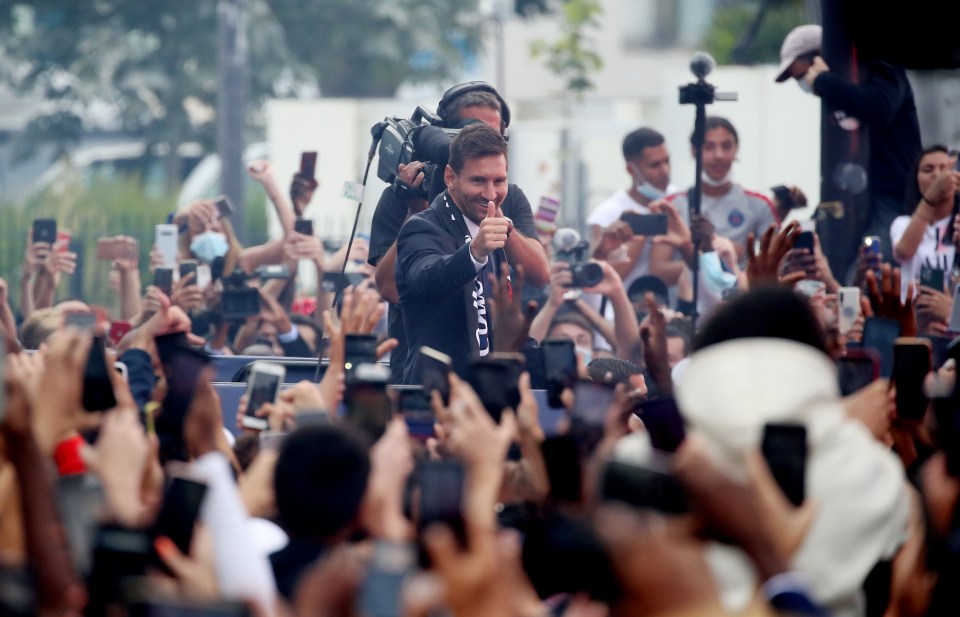 Lionel Messi gave the thumbs up after initially looking a little overwhelmed by his greeting